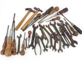 a lot of tools that are laying out on the table