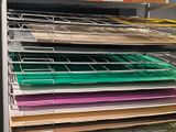 a lot of folders on the shelves in the store