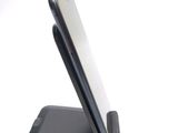 a cell phone that is sitting on top of a stand