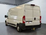 a white van that is parked in a garage