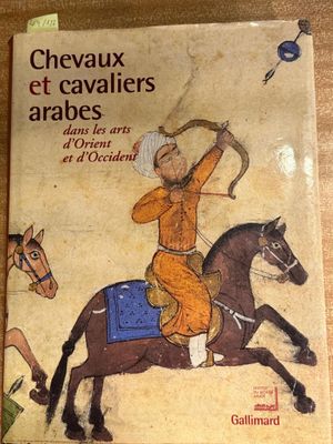 a book with a picture of a man on a horse