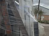 a pile of plastic wrapped up on the side of the road