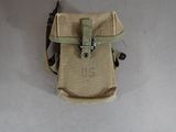 a small pouch with a metal clasp on it
