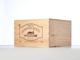 a close up of a wooden box with a label on it