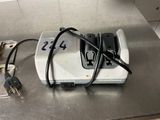 a cord that is connected to a device on a table