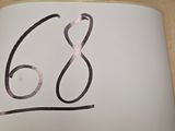 un gros plan sur une feuille de papier sur laquelle figure un dessin