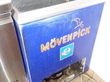 a blue machine that is sitting on the floor