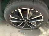 a close up of a tire on a car ' s rim