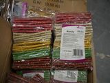 a box full of assorted candy sticks in it
