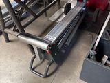 two machines that are sitting in the garage