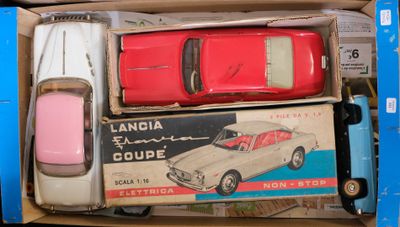 three toy cars in a box on top of each other