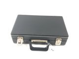 a black briefcase sitting on top of a white table