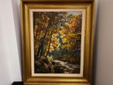 une peinture à l'huile représentant un sentier dans les bois parsemé de feuilles jaunes