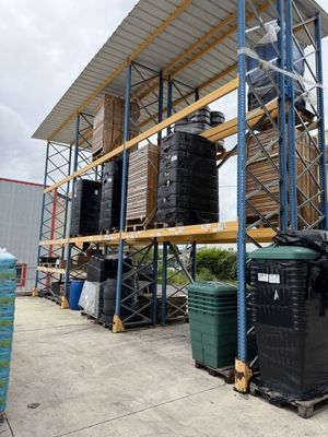 a large storage rack with a lot of barrels on it