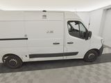 a picture of a white van parked in a garage