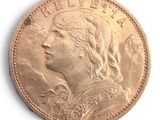an image of a gold coin with a woman ' s face on it