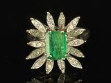 an emerald and diamond ring