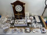a table that has a clock and many other items on it