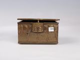 an antique brass box with a lid and two handles