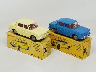 two toy cars that are sitting on top of a box
