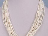 a white pearl necklace on a mannequin mannequin mannequin mannequin mannequin mannequin mannequin mannequin manne
