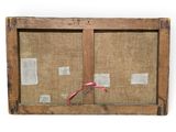 an old wooden window with a red ribbon hanging on it