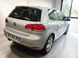 a white car that is parked in a garage