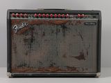a close up of a guitar amplifier sitting on top of a table