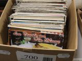 a box full of magazines sitting on a table