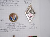 a picture of a notepad with some badges on it