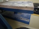 a blue and white stove top with a blue plate on top of it