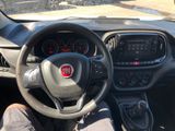a steering wheel and dashboard of a small car