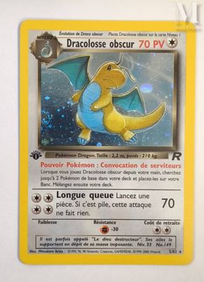 the pokemon card is yellow and has a blue dragon on it