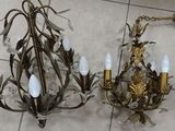 two chandeliers that are on the floor next to each other