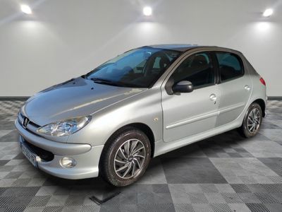 a picture of a silver car on a checkered floor
