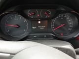 a close up of a car dashboard with a speedometer and gauges
