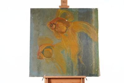 a painting of a goldfish on a easel with a white background
