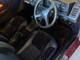 a car that has a steering wheel and a dash board in it