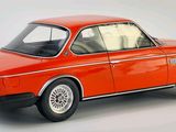 an image of a red model of a car on a white background