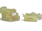 pair of carved jade figurines of a dragon and a box