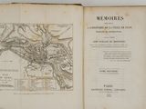 an old book with a map of a town on it