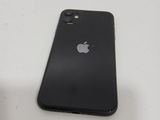 an apple iphone sitting on top of a white table next to a black phone