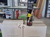 two boxes of beer sitting on a table in a store