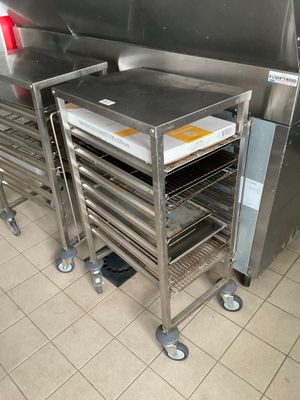 many trays of food in a commercial kitchen
