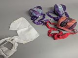 a pair of shoes, a bag, and a pair of headbands on a table