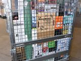 a metal cart with many boxes on it in a warehouse