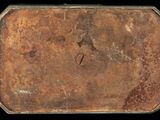 an image of a rusted metal box with a hole in it