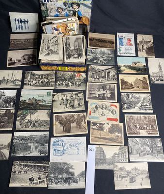 an assortment of old postcards and postcards on a table