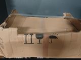 a cardboard box that has a picture of an umbrella on it