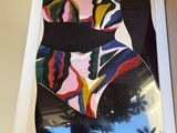 an image of a picture of a woman ' s dress in a box